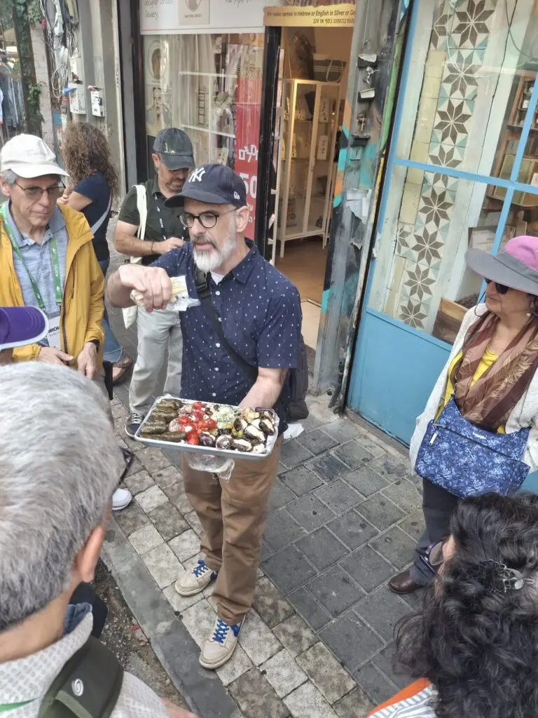Harry Rubenstein guiding a Levinsky Market food tour in Tel Aviv