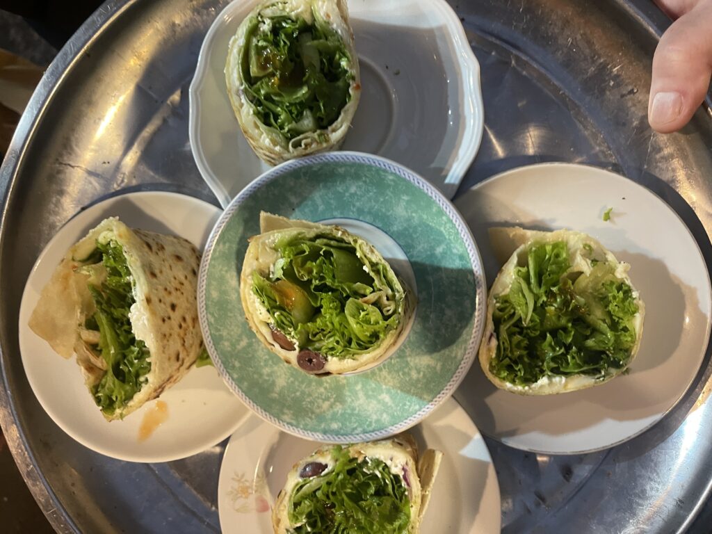 Fresh mufletta from Nona bakery at Mahane Yehuda Market Jerusalem. 