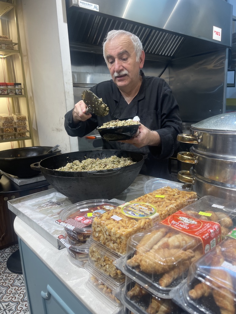 Bukharian plov being served at Mordechai Bukharian Bakery in Mahane Yehuda Market