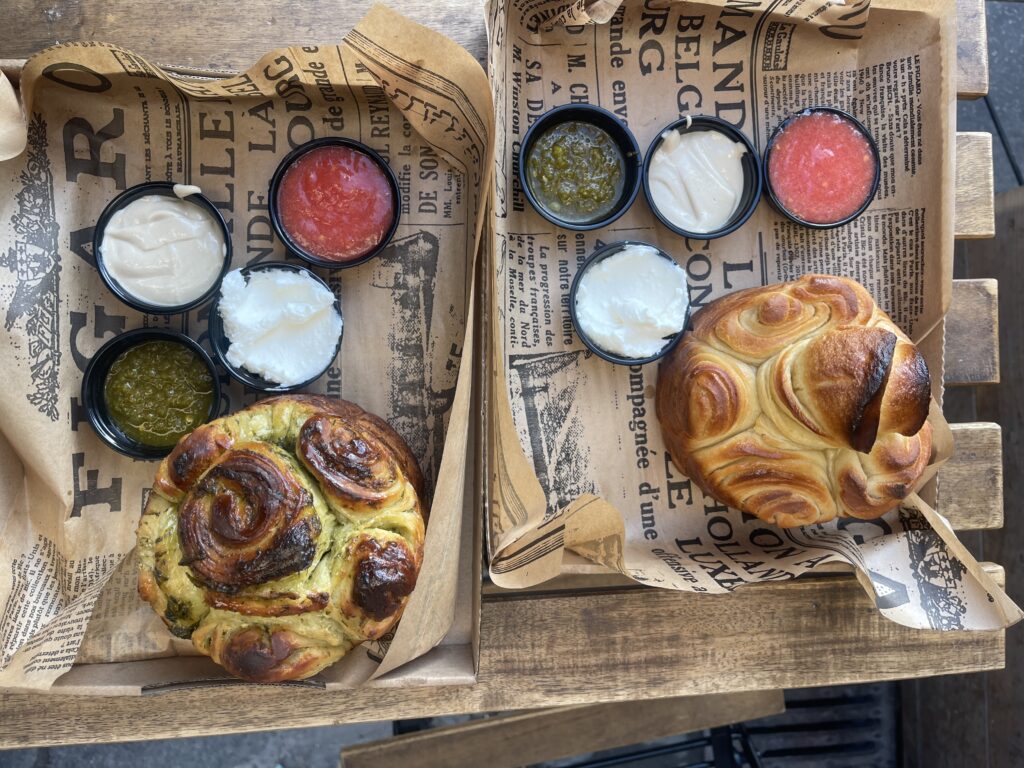 Yemeni kubaneh bread varieties at Joni and Kubaneh stall in Mahane Yehuda Market, Jerusalem.
