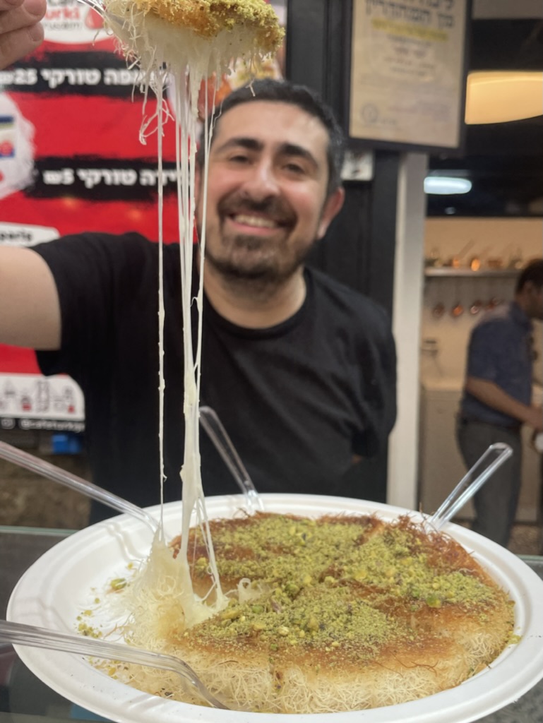 Knafeh with melted cheese and golden kadaif crust at Cafe Turki in Mahane Yehuda Market.